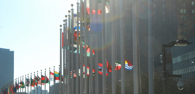 Flags at the UN building in New York. Photo by Juan Tan Kwon, via Flickr.